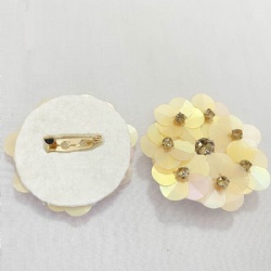 beige sequin flower brooch