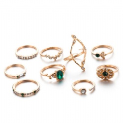 Gold casting with emerald stone ring set